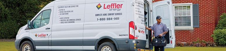 Leffler tech van parked in front of a house
