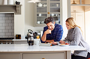 Couple looking at iPad