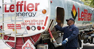 Leffler oil truck and service tech