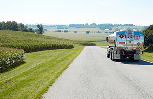 Leffler oil truck driving down road
