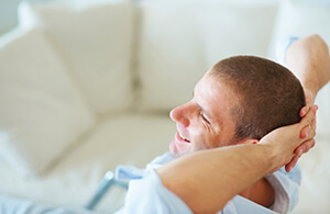 Man relaxing on sofa 