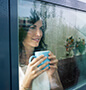 Woman looking out window